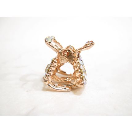 Small mini rose gold bow shaped hair claw clip with crystals