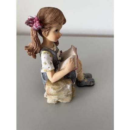 SCHOOLGIRL WITH BOOK RESIN FIGURINE