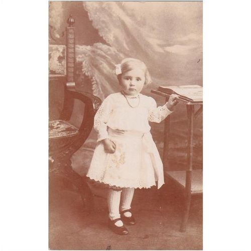 Very Young Girl StandingBy A Table Postcard (CH261)