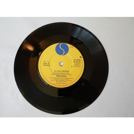 7"MADONNA 1987. LA ISLA BONITA ( REMIX) W8378, 928378-7. YELLOW LABEL.NEAR MINT