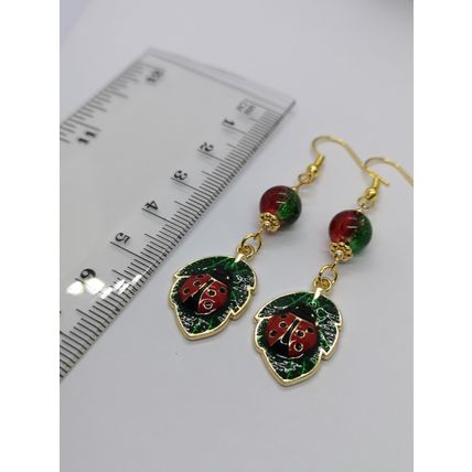 Enamel Ladybird On Leaf Charm And Crackle Glass Bead Earrings Gold Plated Hooks