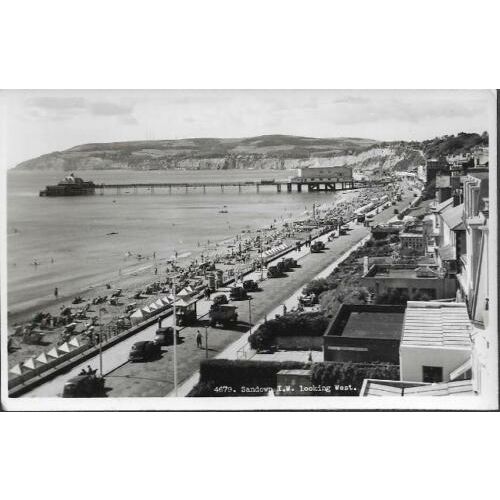 Sandown, Isle of Wight - Looking West, pier, old cars - RP postcard c.1950s