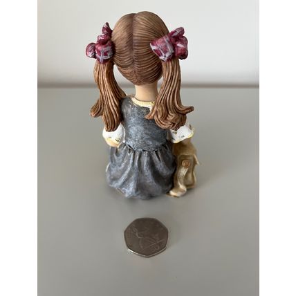 SCHOOLGIRL WITH BOOK RESIN FIGURINE