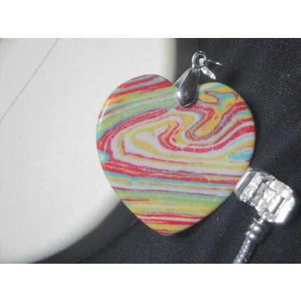 Vibrant bright multi coloured heart pendant on contrast necklace B summer hols