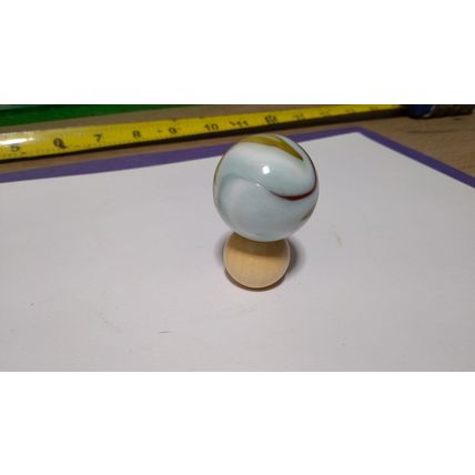 Large Marbled Mystic Marble made from quartz stone with wood holder.