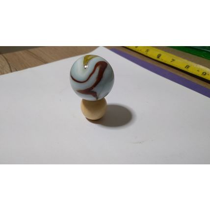 Large Marbled Mystic Marble made from quartz stone with wood holder.