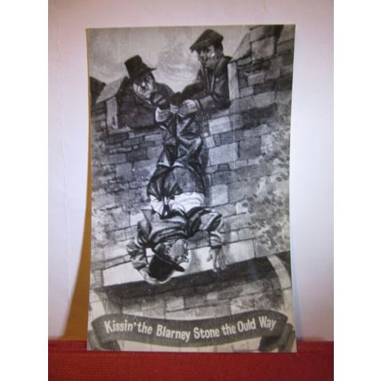 KISSING THE BLARNEY STONE THE OULD WAY, Co. CORK, IRELAND photograph =