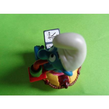 Workaholic smurf with laptop rubber ring and drink