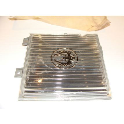 1977 1978 CHRYSLER LEBARON LH HEADLIGHT APPLIQUE NOS #3881695 SOP 3881697