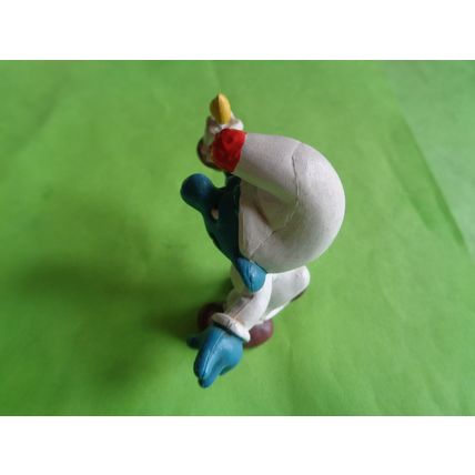 Smurf with a candle