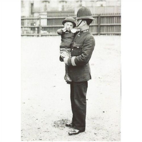 C-36731X: Policeman with a lost child, c.1905.