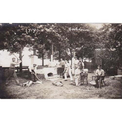 The Cookhouse Showing Ovens Knife Grinder And A Cook Peeling Potatos Postcard