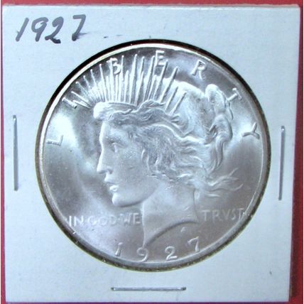 1927 Peace Dollar. This Coin is a replica and contains NO precious metal.