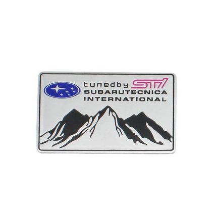 SUBARU TECNICA INTERNATIONAL ST METAL BADGE - BRAND NEW - UK STOCK