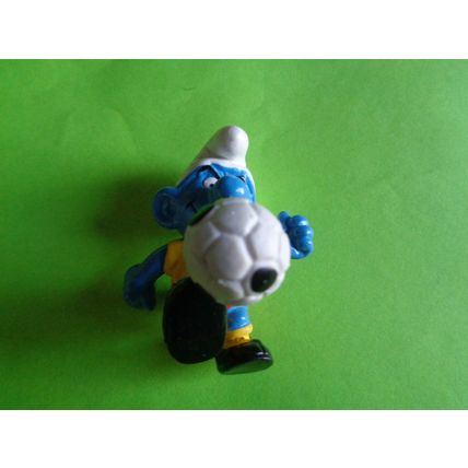 Footballer smurf complete with foot ball