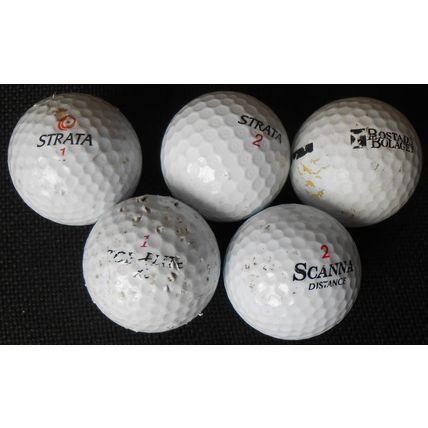 5 used golfballs