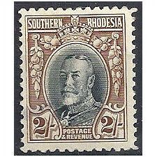 Southern Rhodesia 1933 SG25a 2/- Black & Brown Mounted Mint (thin)..