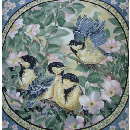 A family of Great Tits in the rose bush cushion. pillow