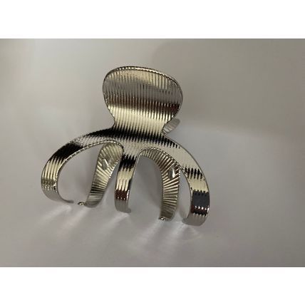 Medium shiny silver tone textured metal hair claw clip