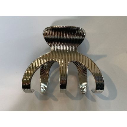 Medium shiny silver tone textured metal hair claw clip