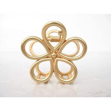 Medium/small gold metal star flower or triangle hair claw clip