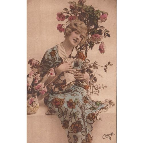 Woman In A Blue Dress With Flowers On Is SurroundedBy Roses Glamour Postcard