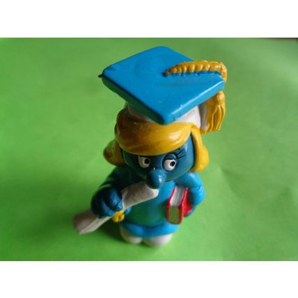 Graduation graduate smurfette in a all blue robe gown and hat