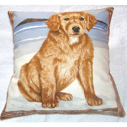 Lovely Golden retriever Pup on the beach cushion pillow