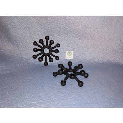 PAIR OF 1960s MODERN DANSK CAST BLACK METAL CANDLE HOLDERS by JENS QUISTGAARD