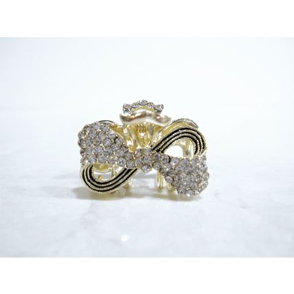 Small mini gold black metal bow tie hair claw clip with crystals