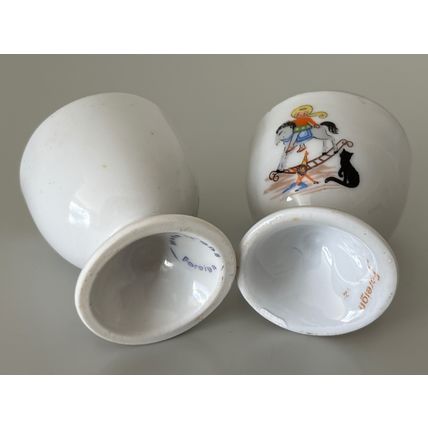 2 X VINTAGE EGG CUPS - GIRL ON ROCKING HORSE