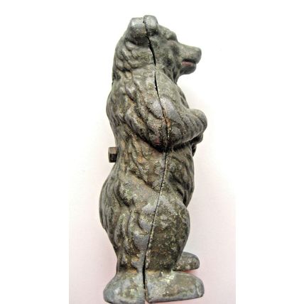 CHERISHED VINTAGE CAST METAL BEAR MONEY BOX FROM 1946.