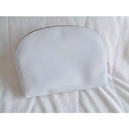 BareMinerals Moxie Plumping Lip gloss Leading Lady 4.5 ml + Make up Bag