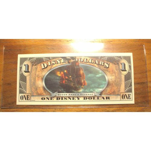 2011 DISNEY DOLLAR- $1. Mint Condition - Pirates of the Caribbean - "F" Series