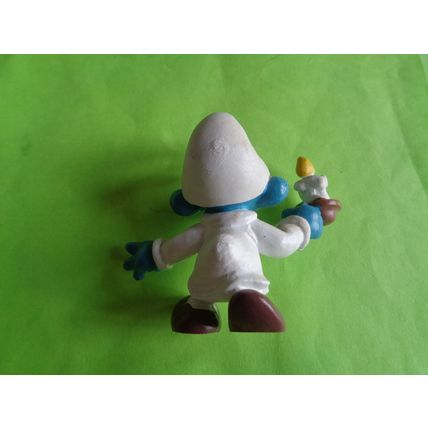 Smurf with a candle