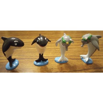 4 McDonald's Sea World PVC Fast Food toys: 2 Shamu Whales & 2 Dolly Dolphins