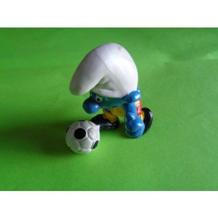 Footballer smurf complete with foot ball