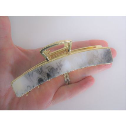 Long gold metal and black gray white marbled acrylic hair claw clip