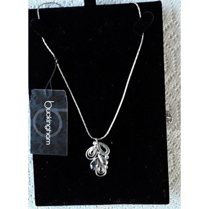 New. Silver coloured pendant with rhinestones.