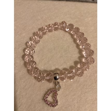 Light pink glass bead bracelet with heart charm