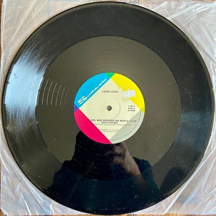 Louie Louie - The Girl Who Seduced The World (12", Single) (Mint (M)) - 36188074
