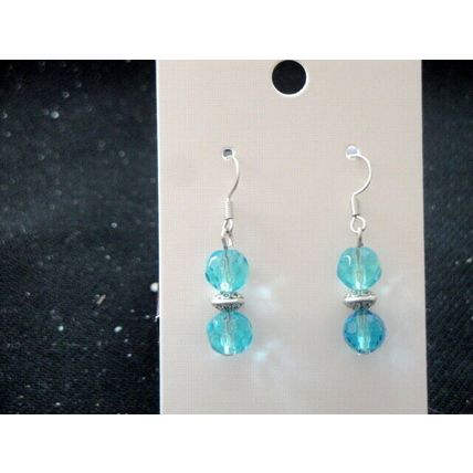 Staggering pair of multi faceted babby blue crystal glass short earrings