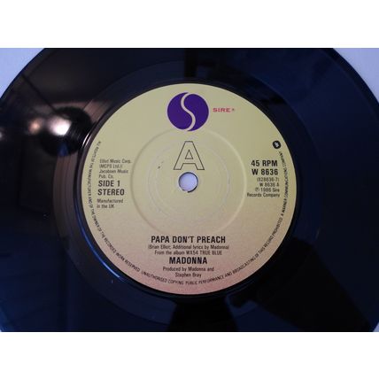 7"MADONNA.1986, PAPA DON'T PREACH.SIRE W8636. BIG DEAL.GLOSSY CARD. NEAR MINT