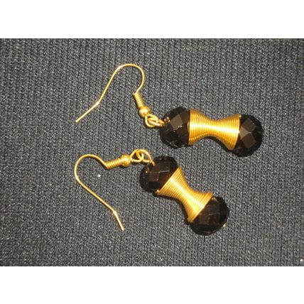 Elegant black crystal glass beads mounted on gold golden coil dangle earrings