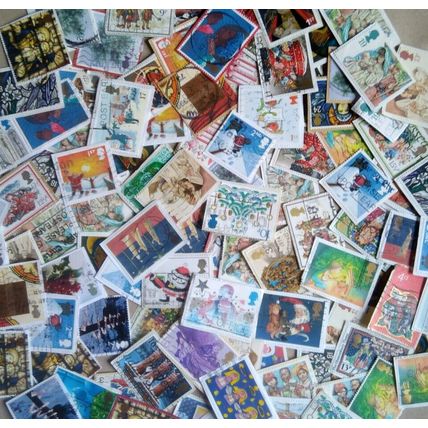 50 GB Commemorative older Christmas stamp bundle job lot on paper assorted