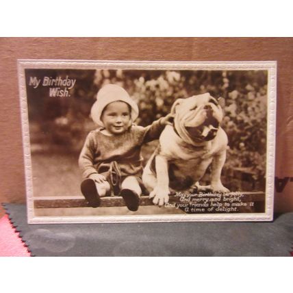a BIRTHDAY WISH .used vintage postcard RP 1928 pm CHILD WITH BULLDOG