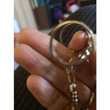 Interesting Pale Orange Glitter Pendant With Metal Detail