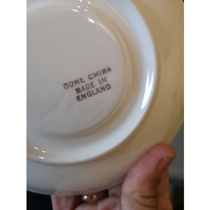White Saucer With Gold Design