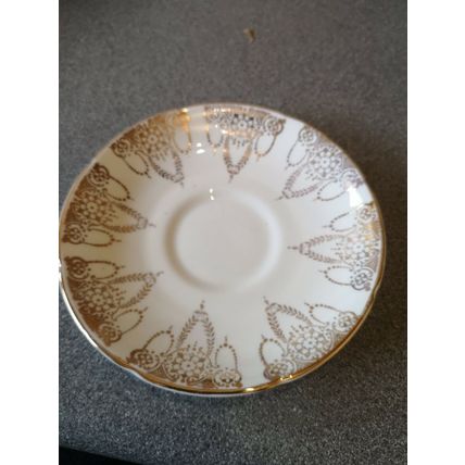 White Saucer With Gold Design