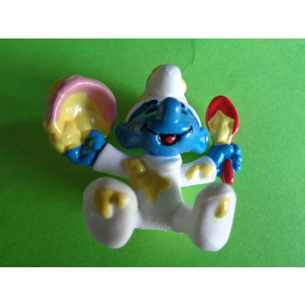 Baby smurf with spoon and bowl